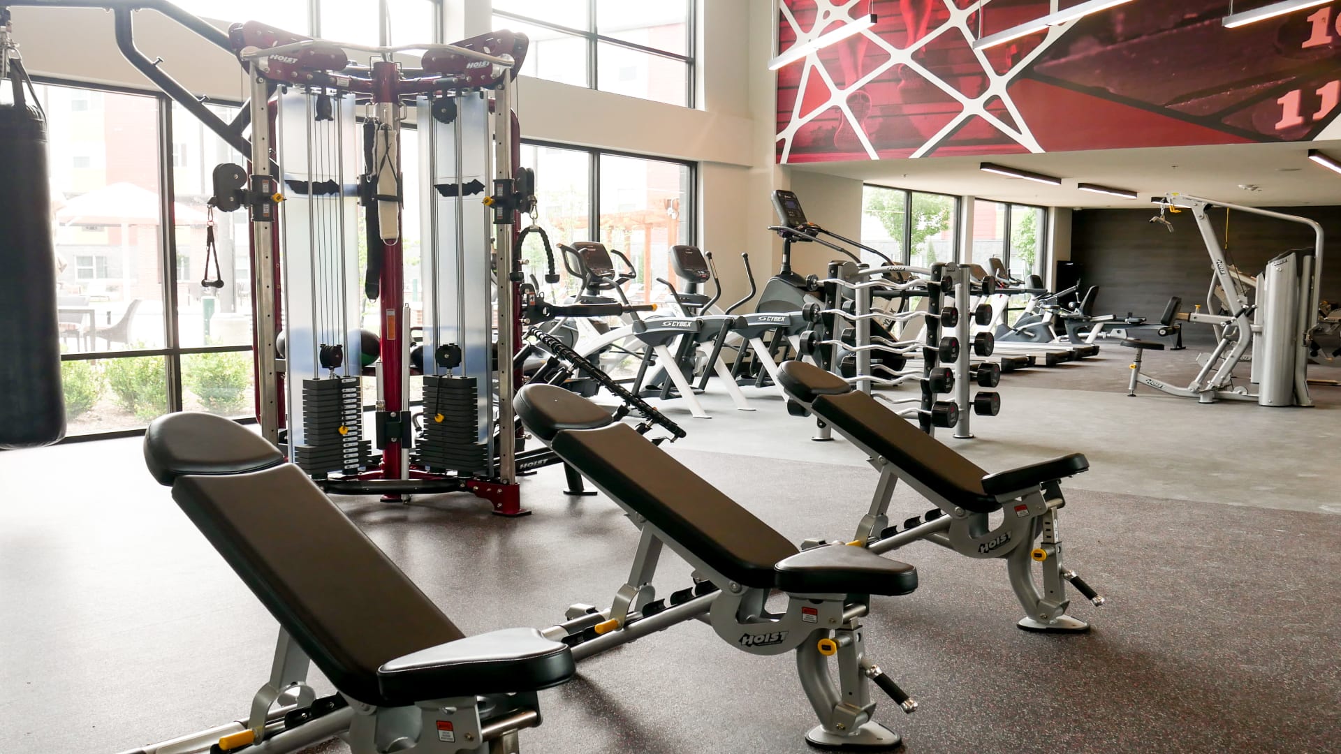 a gym room with equipment and treads at The Terra at University North Park