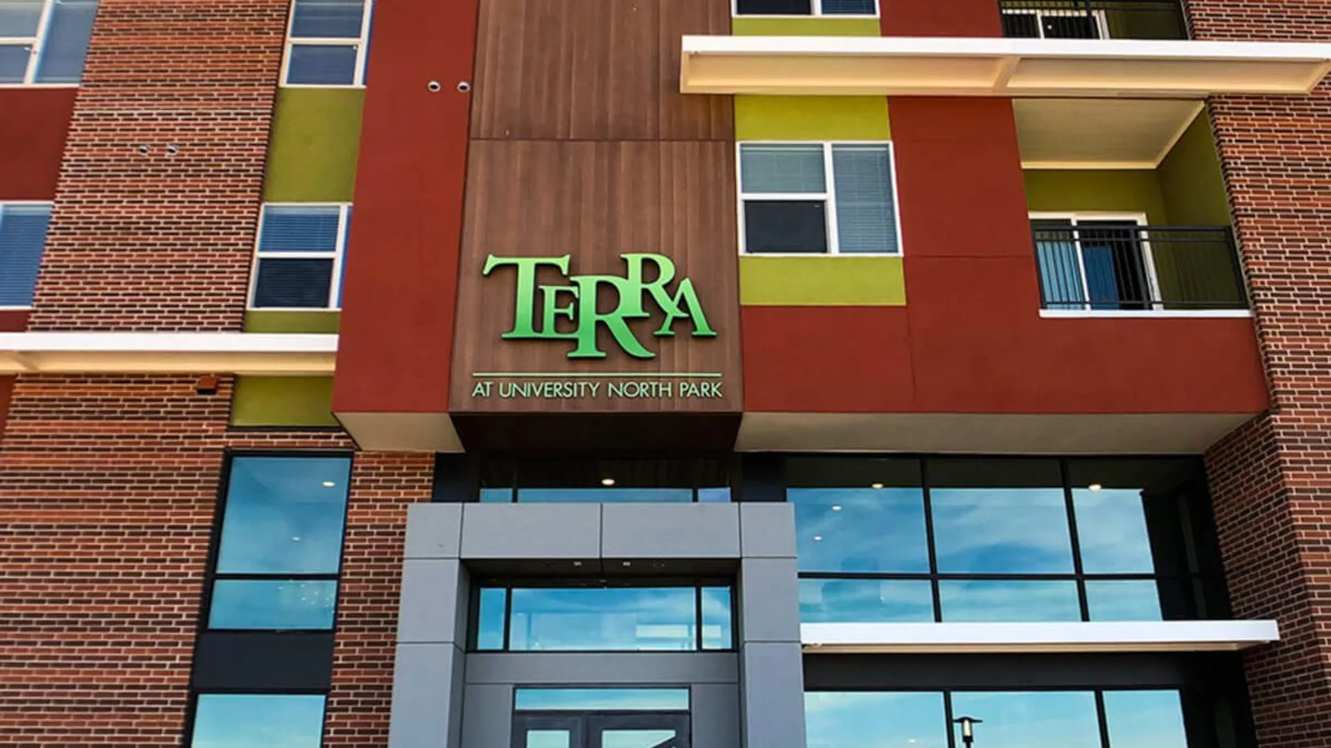 the front of a building with the word terra on it at The Terra at University North Park
